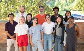 Group image of 2023 new MFA student cohort during a screen printing workshop at UT Austin