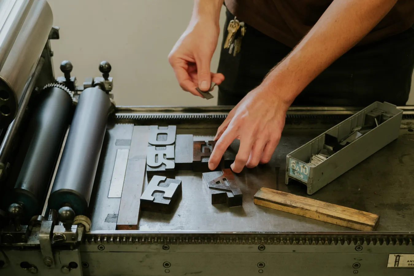 RRK letter blocks on press
