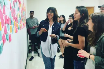 Doreen Lorenzo works with students in a class offered by the Center for integrated Design. Photo by Michelle Harris.