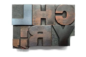 close up image of Rob Roy Kelly Woodtype Collection by Romy Suskin for The Alcalde