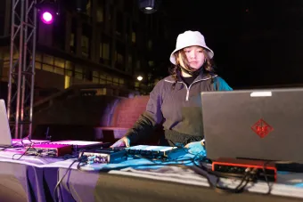 Arts and Entertainment Technologies student performing original music live at Ride the Synthwave event sponsored by Nelda Studios
