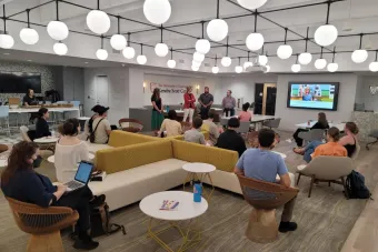 A packed house in the Kendra Scott Center during an in-person Fall 2022 Career City Limits Speaker Series session presented by Industry Relations