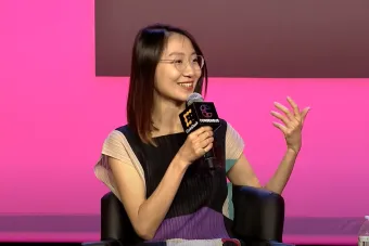 Design professor Jiabao Li speaking on a panel about artificial intelligence for Coin Desk