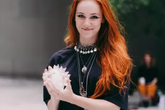 Anya Koehne holding an abstract object