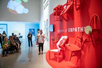 Graduate design student presenting thesis project in front of faculty