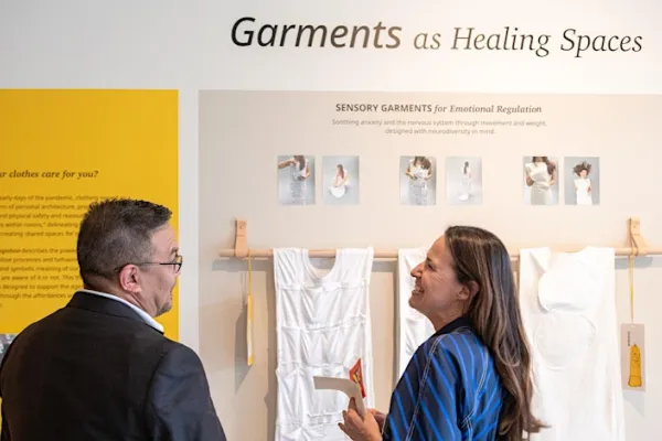 MFA Candidate presenting thesis called Garments as Healing Spaces