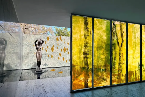 Sculpture in a partially indoor and partially outdoor space.