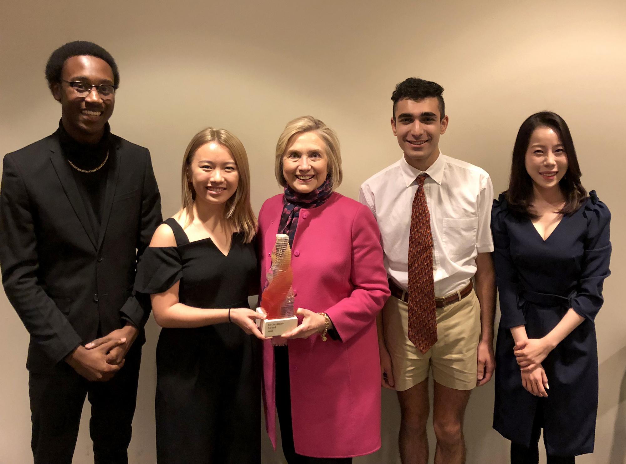 Some of the In The Arena Award design team with recipient Senator Hillary Clinton