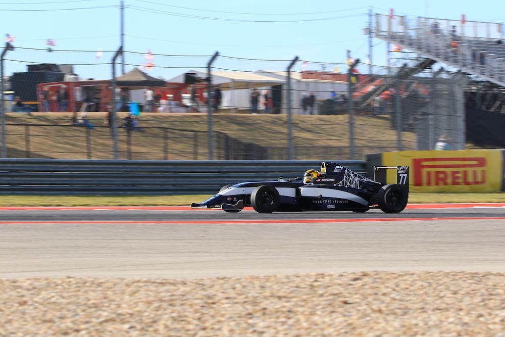 Race car driver Kory Enders driving the Valkyrie Velocity, designed by UT Austin student Hadley Chillura, in the 2019 Formula 4 Championship