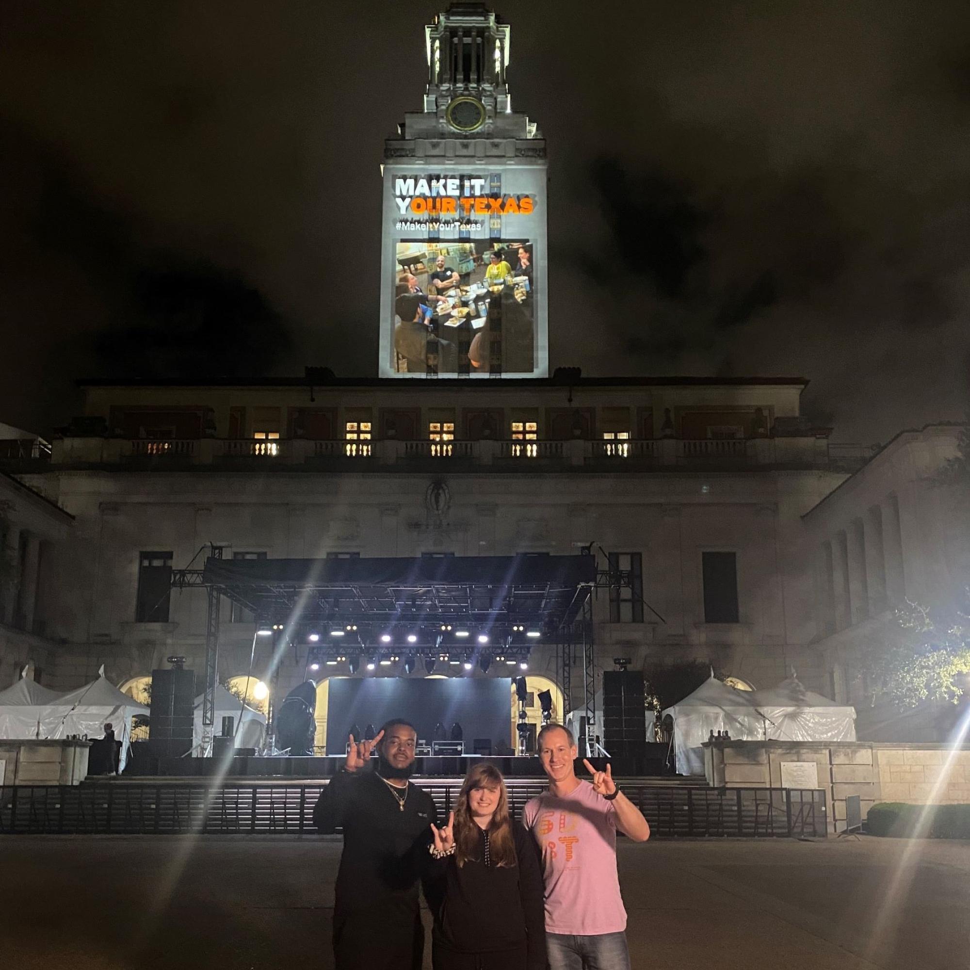 Andrew Augustin, Marin Clarke, Michael Baker in front of UT Tower 