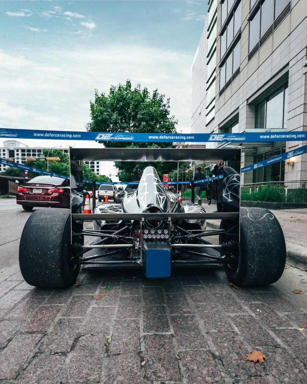 A back-end view of the Valkyrie Velocity on Congress Ave in anticipation of the 2019 Formula 4 Championship at Circuit of the Americas in Austin, Texas. The wrap was designed by UT Austin senior Hadley Chillura