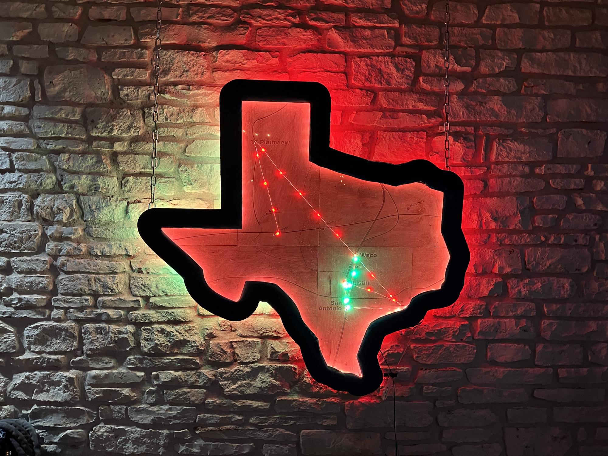 Image of LED-lighted wood cutout of Texas create by undergrad Design student for Jose Perez' Objects and Spaces class