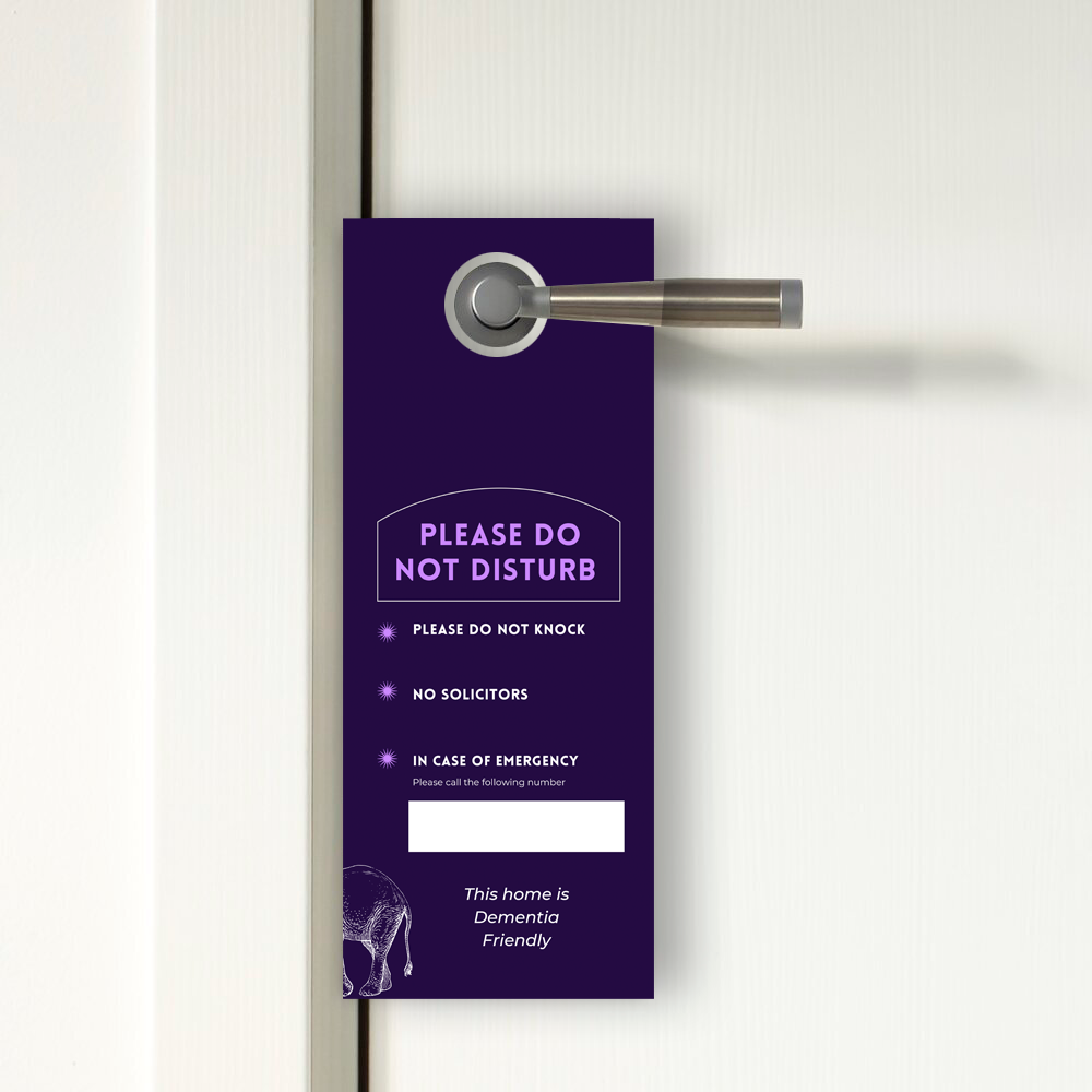 A deep purple door hanger hangs on a modern silver door handle against a white door. The hanger reads "PLEASE DO NOT DISTURB" in bold lavender text, followed by check-marked requests: “Please do not knock,” “No solicitors,” and “In case of emergency, please call the following number,” with a white blank space for writing. At the bottom, it states, “This home is Dementia Friendly,” accompanied by an illustrated elephant in the lower-left corner.