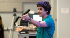 Summer Design Camp Director Jessie Contour introducing projects during the Summer 2022 Game Design Camp Showcase