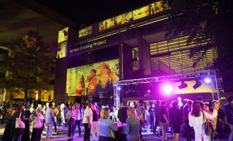 student created projection on the Doty Fine Arts building at Austin Design Week 2021 opening night event