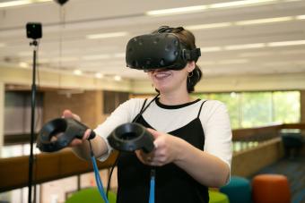 A person is playing VR