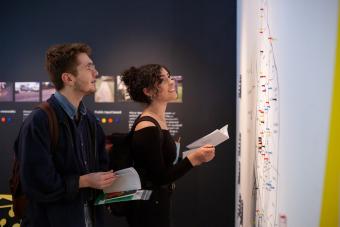 Attendees interacting with project at Spring 2019 MFA exhibition Work for Progress