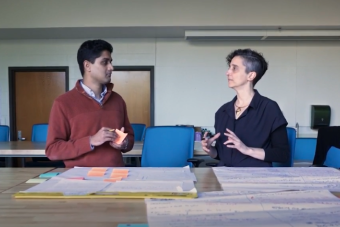 MA in Design focused on Health graduate Nikhil Mahadevan and professor Tamie Glass in a classroom