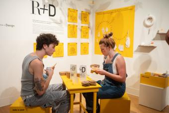 Photo of 2022 MFA Exhibition Over Under attendees interacting with R and D installation