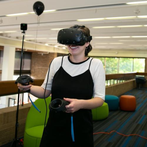 SDCT intern Michaela Newman tries virtual reality for the first time