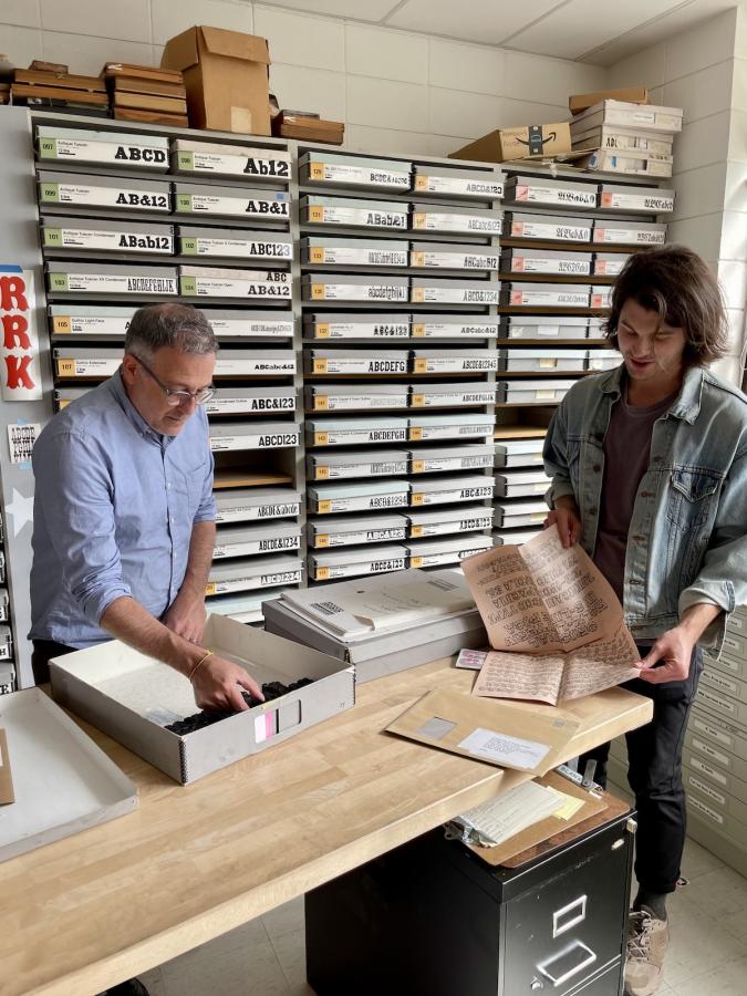 David Shields marveling at the Rob Roy Kelly American Wood Type Collection with current Design Custodian Henry Smith
