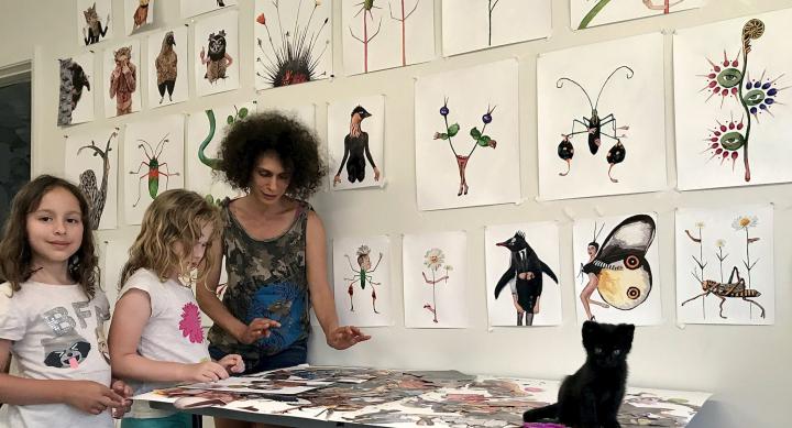 Arts and Entertainment Technologies faculty member Yuliya Lanina creating artwork with her two daughters at home while quarantining during COVID-19