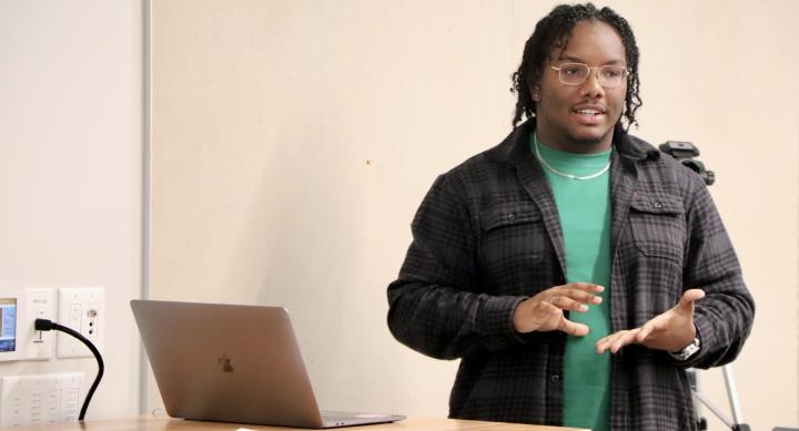 Design student Khalil J. Davis presenting his work during the Fall 2022 Sophomore Review in the Department of Design at UT Austin