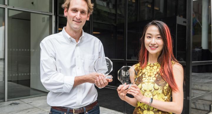 Professor Jiabao Li and MFA in Design student Brad Hakes receiving their awards at the 2023 Biodesign Challenge Summit at MoMA