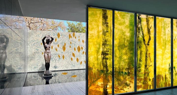 Sculpture in a partially indoor and partially outdoor space.